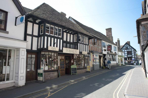 Shopping High Street in Much Wenlock Shropshire UK